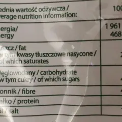 Tabela wartości odżywczych dla 100g produktu: energia, tłuszcz, węglowodany, błonnik, białko, sól.