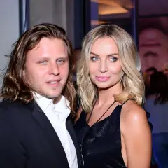 Piotr Woźniak Starak z żoną na evencie.
