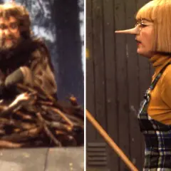 En man med skägg och glasögon sitter på en hög med ved. Bredvid honom en kvinna med näsa som Pinocchio, kanske är det ugglan Helge som har en hemlighet.