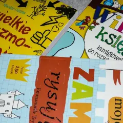 Książki z zadaniami dla 10 latka: "Wielka księga łamigłówek", "Wielkie gryzmolenie" i "Rysuj zamki".