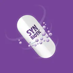 Biała kapsułka z napisem "SYN BIOTIC" na fioletowym tle. Drobne kuleczki unoszą się wokół. Dowiedz się, synbiotyk co to.