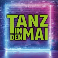 Tanz in den Mai Solingen: Grüne Schrift auf Neon-Rahmen vor Ziegelwand.