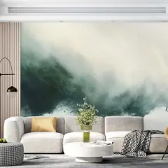 Plakat kolorowy z abstrakcyjnym motywem zieleni i bieli zdobi ścianę salonu.