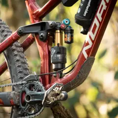 Close-up of a Norco Sight bike's rear suspension, featuring a Fox Float X2 shock. This detailed shot is perfect for a fox float x2 review.
