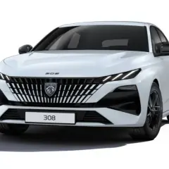 Nowy Peugeot 308 w białym kolorze, z charakterystycznym grillem i ostrymi światłami LED. Elegancki i nowoczesny design.