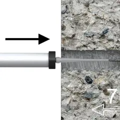 Pistolet do kotwy chemicznej aplikuje masę do otworu w betonie.