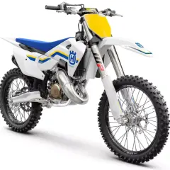 Biały motocykl crossowy Husqvarna 125 z niebieskim siedzeniem i żółtymi akcentami.