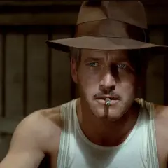 Paul Newman med hatt och cigarett i munnen, en ikonisk scen från filmer med Paul Newman.
