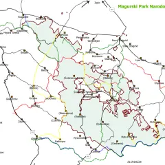 Mapa Magurskiego Parku Narodowego z zaznaczonymi szlakami turystycznymi, drogami i miejscowościami.