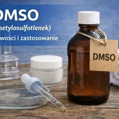 Butelka z DMSO, czyli dimetylosulfotlenkiem, obok kremu i pipety. Dowiedz się, co to jest DMSO, jakie ma właściwości i zastosowanie.