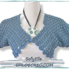 Modelli coprispalle uncinetto schemi gratis: un bolerino azzurro con pizzo, perfetto per ogni occasione.