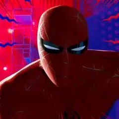 Spider-Man, prêt à utiliser son pouvoir, se tient dans une ville aux couleurs vives, rouge et bleue.