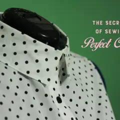 A white polka dot shirt with a crisp collared neckline, ready for sewing perfection.