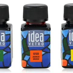 Butelki farb "idea Vetro" w kolorach zielonym, pomarańczowym i żółtym. Idealne, gdy zastanawiasz się, jakie farby do malowania na szkle wybrać.