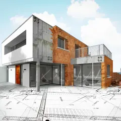 Budowa domu zaczyna się od planów. Nowoczesny dom w budowie, z cegły i betonu, na tle rysunków technicznych.