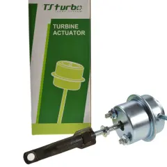 Zawór podciśnienia turbiny Ford Focus 1.6 TDCI. Element metalowy z grzybkiem i regulowanym ramieniem, obok zielono-białe opakowanie z napisem "TURBINE ACTUATOR".