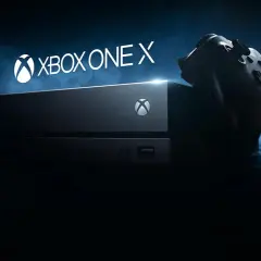 Konsola Xbox One X i kontroler na ciemnym tle. Gotowi na epicką rozgrywkę?