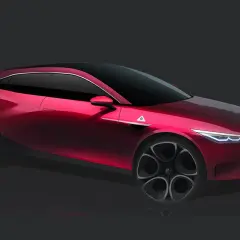 Un boceto de un Alfa Romeo Giulietta Quadrifoglio Verde rojo brillante, con llantas distintivas y el trébol verde en el guardabarros.