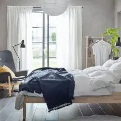 Jakie dodatki do szarej sypialni sprawią, że stanie się przytulna?