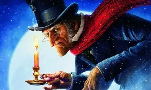 Ebenezer Scrooge, w cylindrze i szaliku, trzyma świecę. Czy znasz tę historię? Quizy opowieść wigilijna.