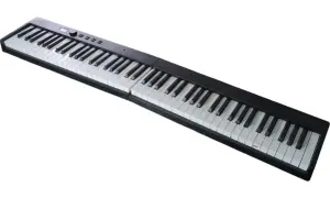 Czarny keyboard z białymi klawiszami, gotowy do tworzenia cyfrowych nut.