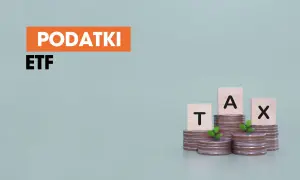 Podatki ETF. Monety i kostki z literami tworzą napis TAX. Dowiedz się, co to jest podatek Belki.