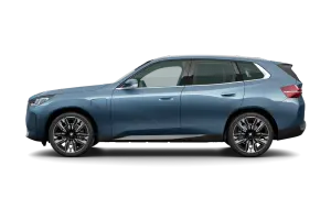 Niebieski BMW X3 z profilu, pokazujący jego elegancką sylwetkę i nowoczesne felgi. Idealny do poznania BMW X3 wymiary.