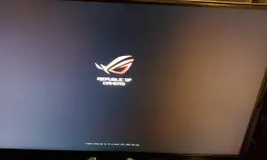 Logo ROG "Republic of Gamers" y mensaje "Press DEL or F2 to enter UEFI BIOS setting". La tecla ASUS BIOS es F2.