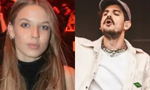 Dziewczyna o jasnych włosach i raper Taco Hemingway na scenie.