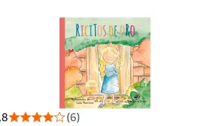 La portada del libro "Ricitos de Oro" muestra a una niña rubia con rizos dorados, vestida con un traje azul, sonriendo y con los brazos cruzados. La rodea un entorno de cuento de hadas con osos y una casa de madera.