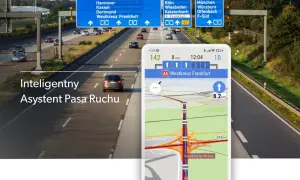 Nawigacja pokazuje wyznaczanie trasy z pominięciem dróg płatnych, prowadząc przez autostradę A5 do Frankfurtu.