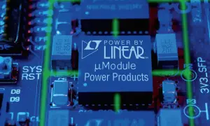 Elektroniczny moduł z zielonymi liniami, widoczny jest układ scalony "Power by Linear" oraz elementy, które mogą tworzyć dzielnik napięcia.
