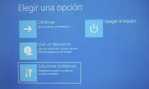 Pantalla de opciones de Windows 11: Continuar, Usar un dispositivo, Solucionar problemas. Útil para saber como saber si Windows 11 está activado.