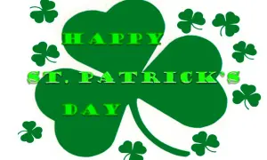 Tréboles verdes rodean el texto "Feliz Día de San Patricio".