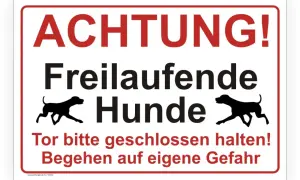 Achtung! Freilaufende Hunde. Ein fremder Hund rennt auf meinen Hund zu. Tor bitte geschlossen halten!