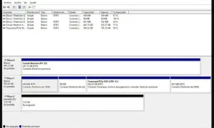 Zarządzanie dyskami pokazuje partycje, w tym dysk C: z systemem operacyjnym i partycje na dyskach E: i D:. Widoczna jest też partycja z systemem wsappx.