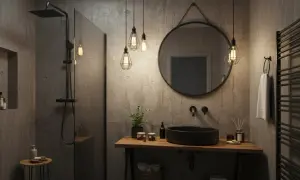 Nowoczesna łazienka industrialna z betonowymi ścianami, czarną umywalką i prysznicem. Wiszące lampy dodają klimatu.