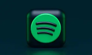 Ikona Spotify na ciemnym tle.