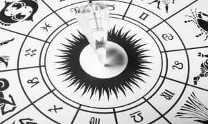 Wahadło nad kołem zodiaku, symbolizujące poszukiwanie odpowiedzi na pytanie: jakim znakiem zodiaku jestem.
