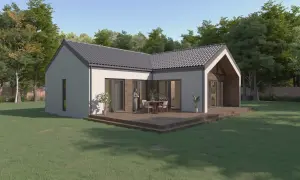 Nowoczesny dom w kształcie litery L z tarasem i zielonym ogrodem.