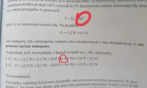 Fragment tekstu z fizyki z zaznaczonym symbolem ΔF i równaniami.