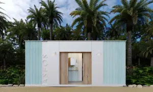 Diseño moderno para saber como hacer un baño exterior, con palmeras y arena.