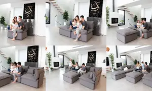 Familia disfrutando de un momento de paz en su moderno centro de relax, con un sofá modular gris y una escalera de diseño.
