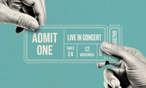 Hands exchange a concert ticket. A resale ticket means someone is selling their ticket to another person, often at a different price.