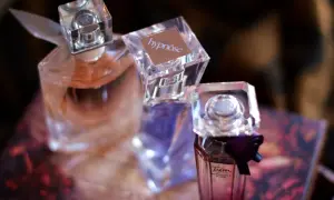 Trzy flakony perfum Lancôme: Hypnôse, Trésor Midnight Rose 75ml i jeden z różową wodą.
