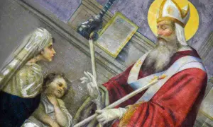 La storia di San Biagio: il santo vescovo benedice un bambino con una spina in gola, mentre una donna osserva.
