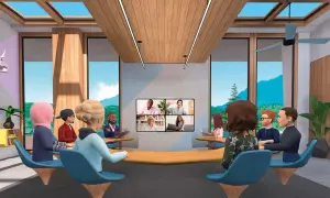 Wirtualne spotkanie w metaverse. Awatary ludzi siedzą przy stole, patrząc na ekran z wideokonferencją.