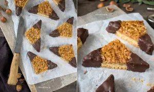 Dreieckige Nussecken mit Schokoladenboden, perfekt für ein Nussecken Rezept. Knusprig, süß und schokoladig.
