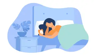 A woman in bed holds an alarm clock, wondering if 6 and a half hours of sleep is enough.