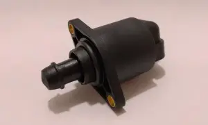 Válvula IAC negra, pieza esencial para el control del ralentí del motor.
